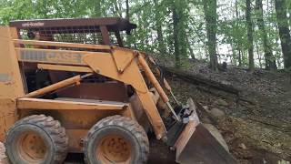 Moving gravel with the Case 1845c skid steer [upl. by Brosine]