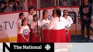 O Canada performed in Ojibway at Jets game [upl. by Crespo]