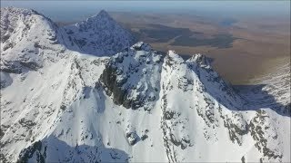 Black Cuillin winter ridge flight footage Skye Scotland from the air by drone [upl. by Suiremed990]