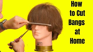 How to Cut Bangs at Home  TheSalonGuy [upl. by Aynod]