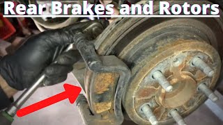 How to Replace Rear Brakes and Rotors Buick Regal [upl. by Arej265]