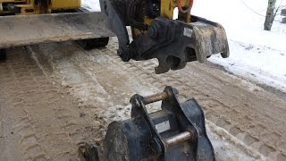 How To Use Cat Mini Excavator Quick Coupler [upl. by Dixon358]